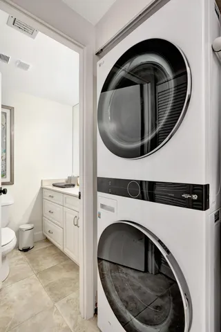 a view of a lake with a house in the background