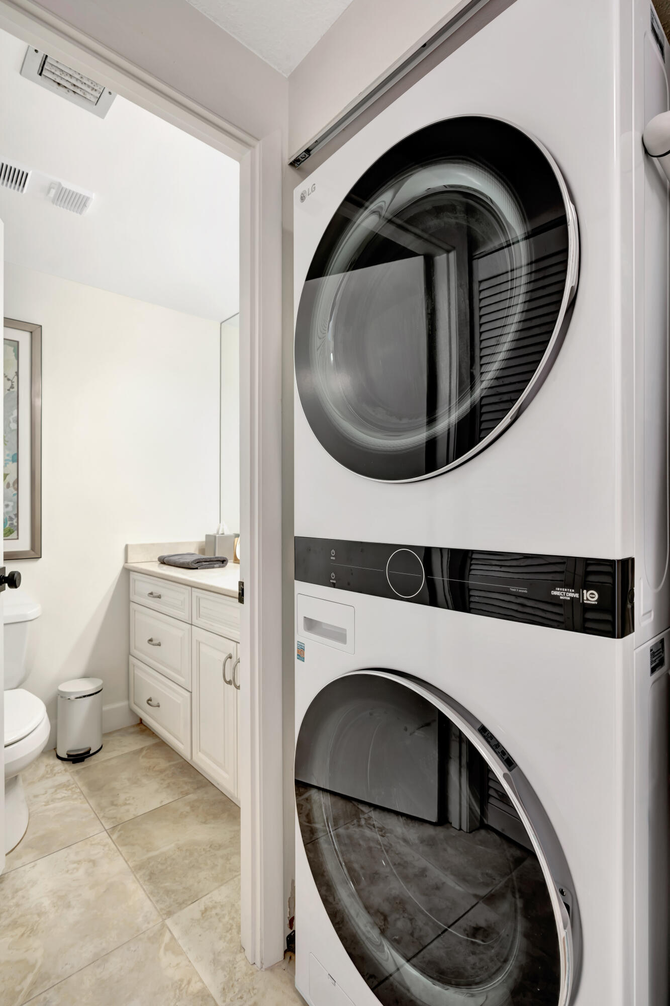 353 Highway 1, Unit A4 Jupiter, FL 33477 - Photo 49 of 51 a utility room with dryer and washer