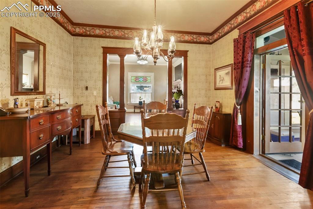 119 South 3rd Street Victor, CO 80860 - Photo 21 of 38 a view of a dining room with furniture window and wooden floor