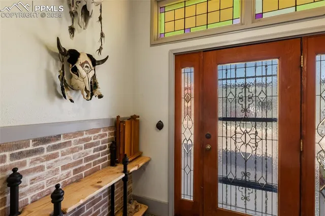 a front view of a house with wooden stairs