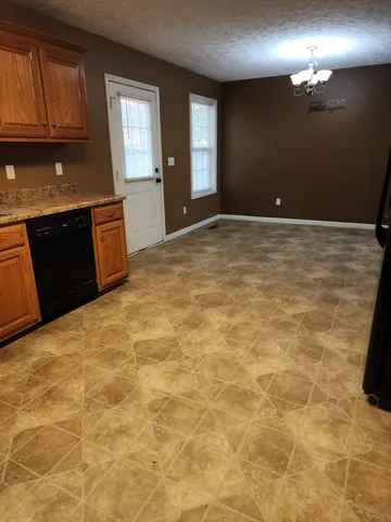 a view of a kitchen with a sink