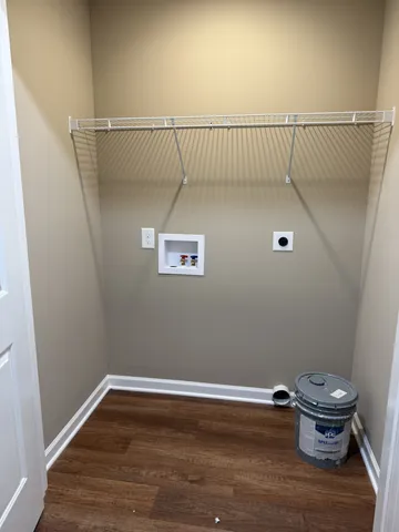 a view of a room with racks on the wall