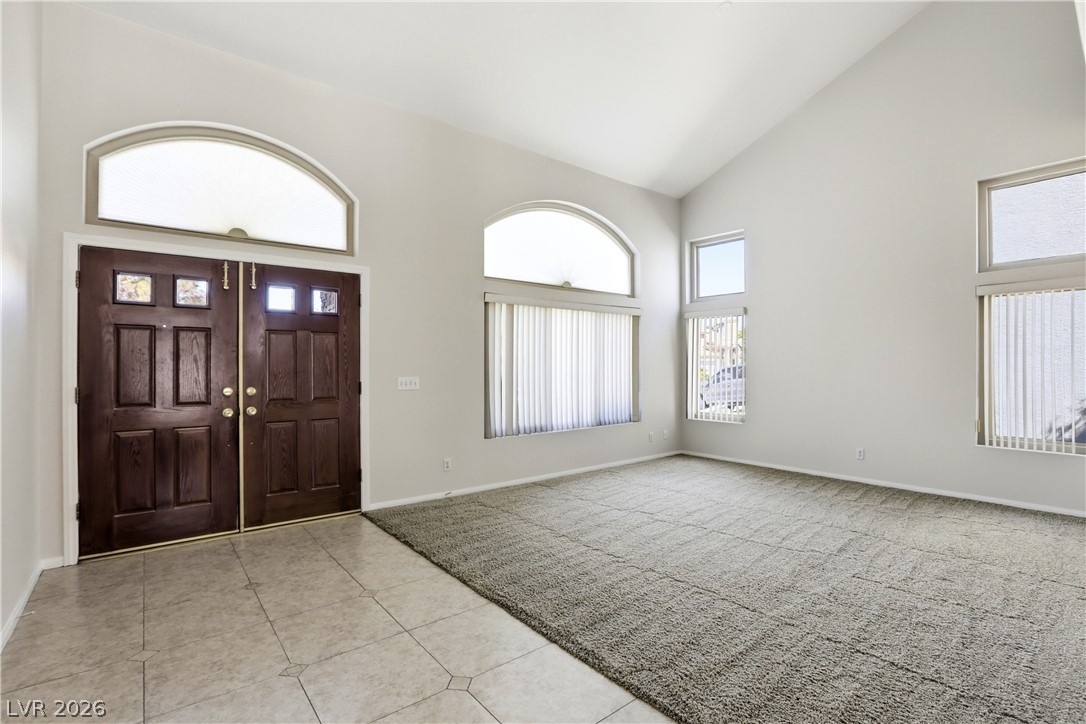 3692 River Canyon Road Las Vegas, NV 89129 - Photo 8 of 69 Living room and grand entryway at front