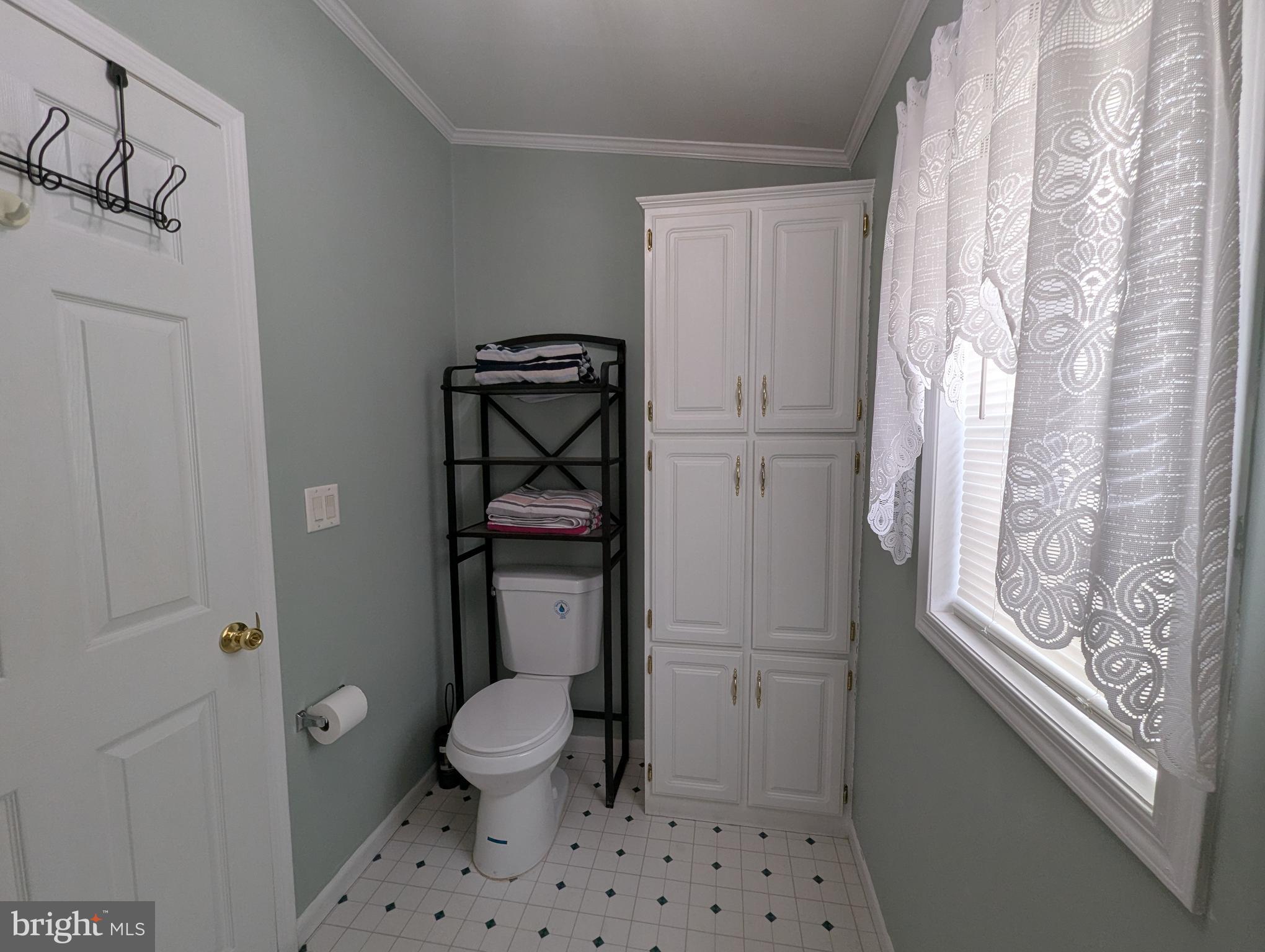 248 Williams Lane Red Hill, PA 18076 - Photo 15 of 37 a bathroom with a toilet a sink and a window