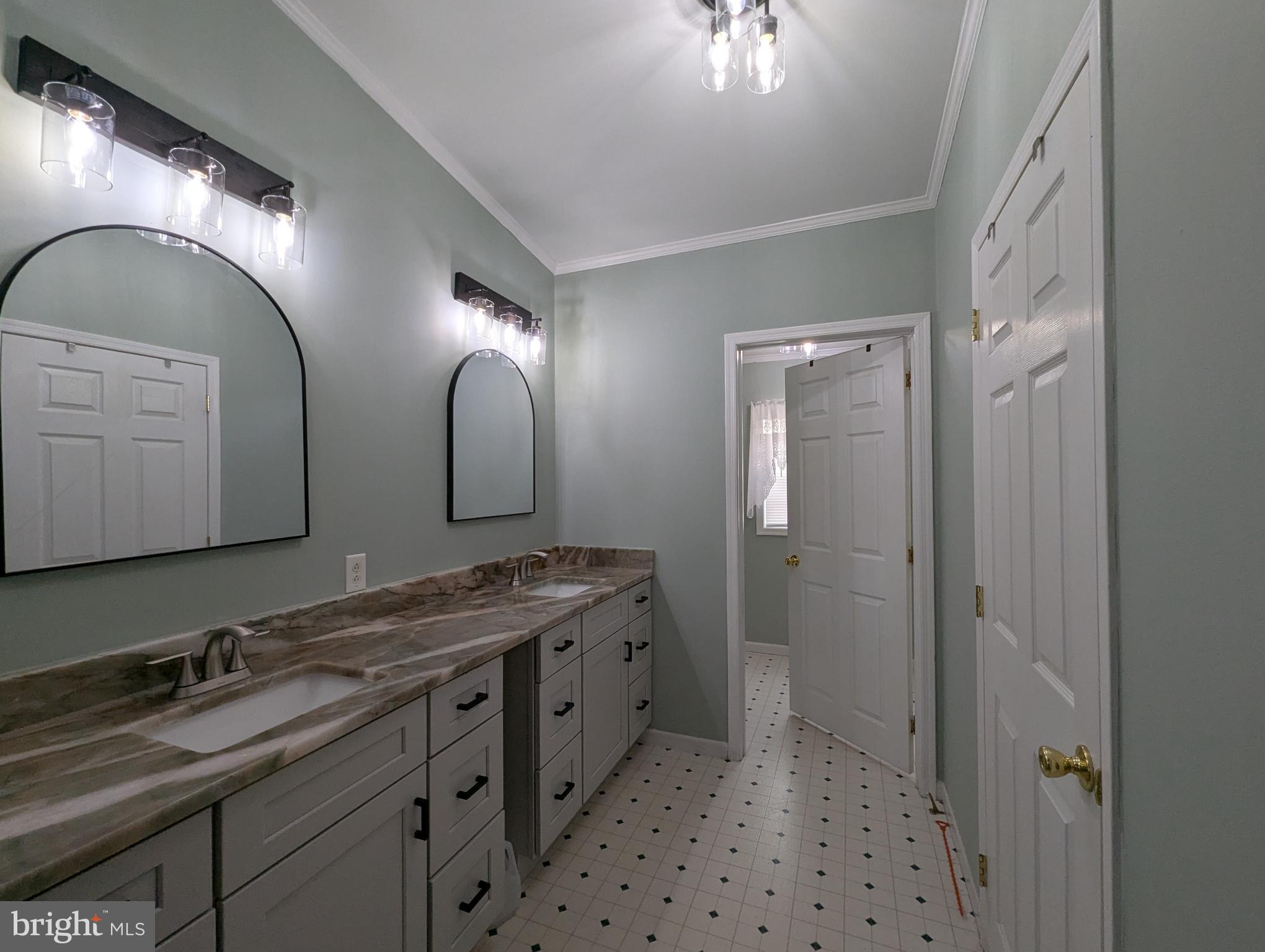 248 Williams Lane Red Hill, PA 18076 - Photo 16 of 37 a bathroom with a double vanity sink mirror and shower