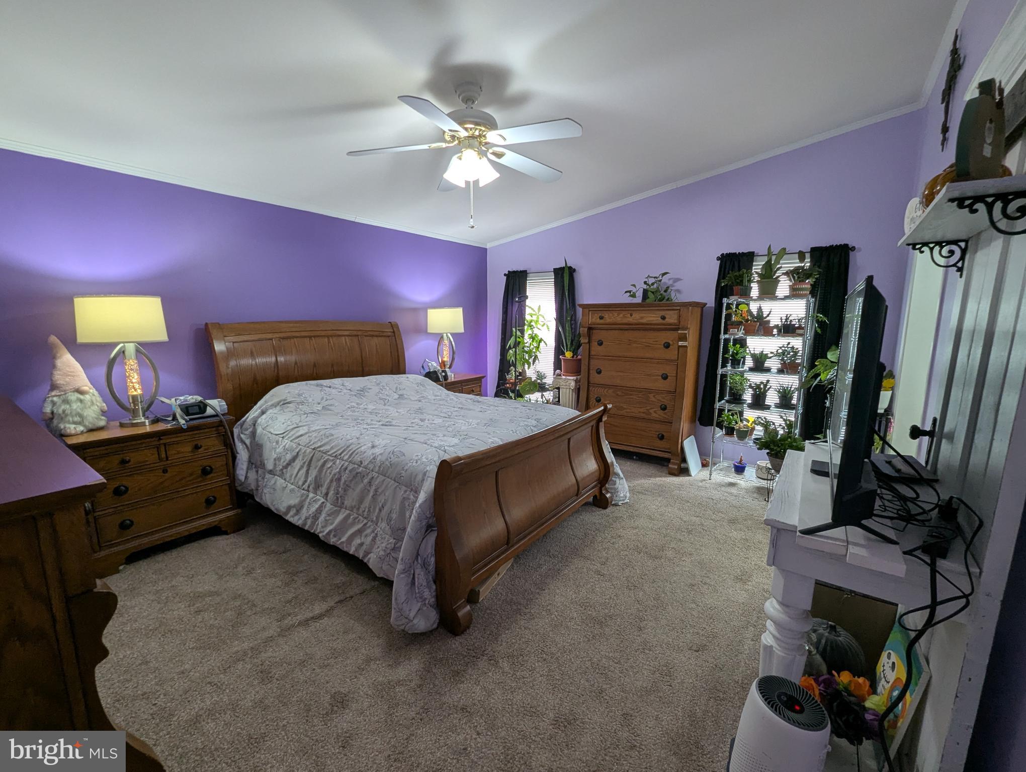 248 Williams Lane Red Hill, PA 18076 - Photo 19 of 37 a bedroom with a bed and a chandelier