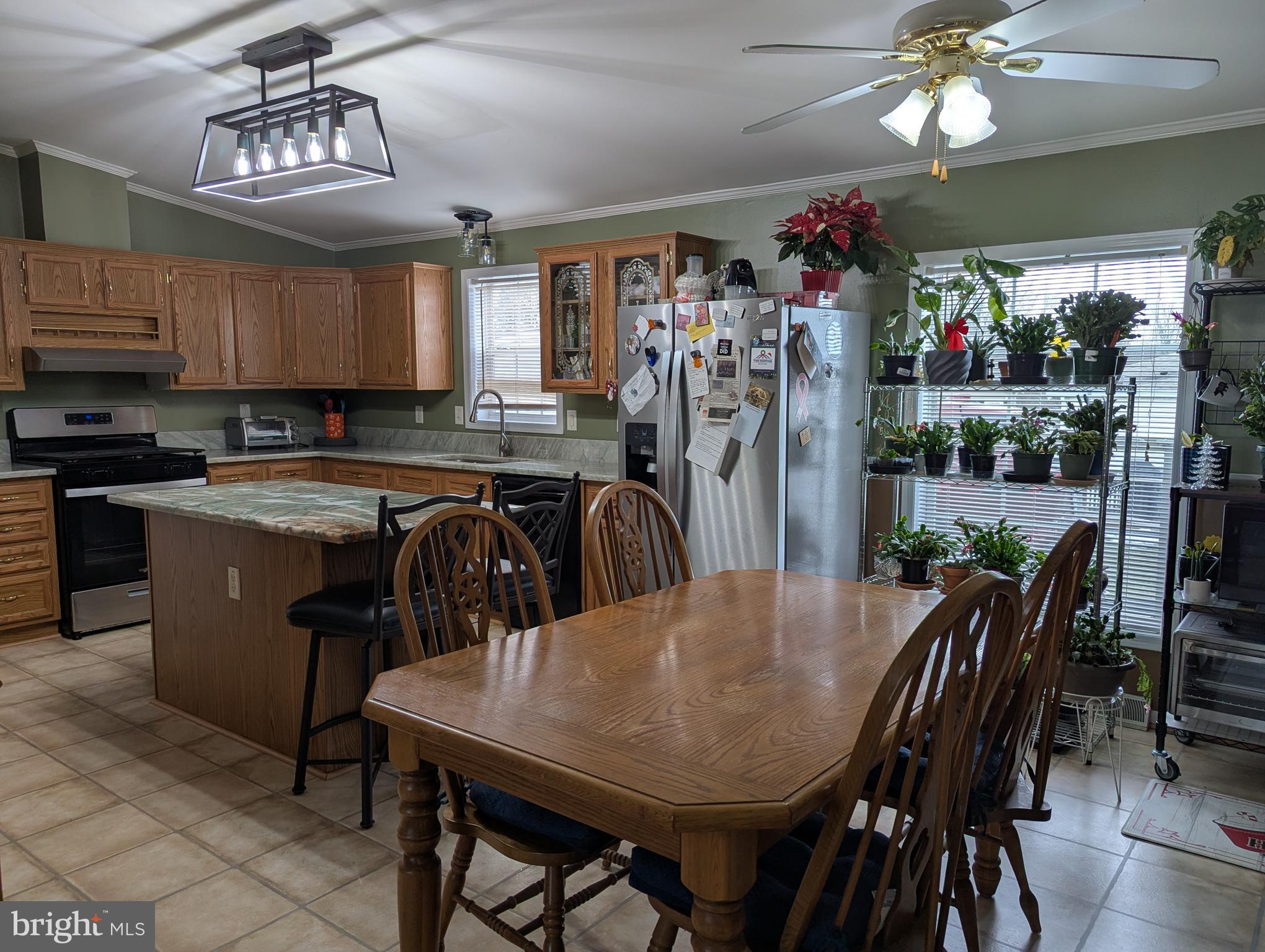 248 Williams Lane Red Hill, PA 18076 - Photo 23 of 37 a view of a dining room with furniture and chandelier