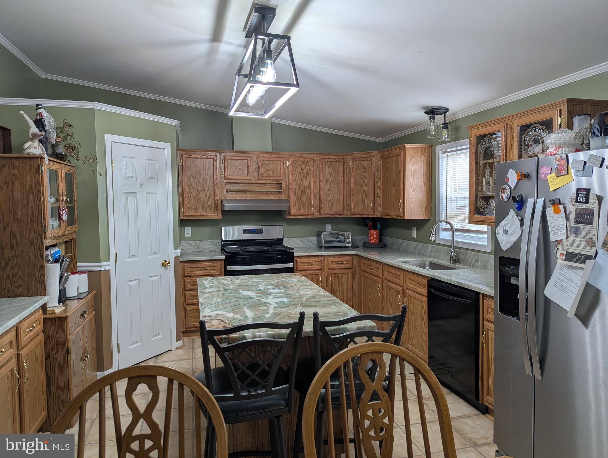 248 Williams Lane Red Hill, PA 18076 - Photo 24 of 37 a kitchen with stainless steel appliances granite countertop a refrigerator a stove top oven a sink and dishwasher