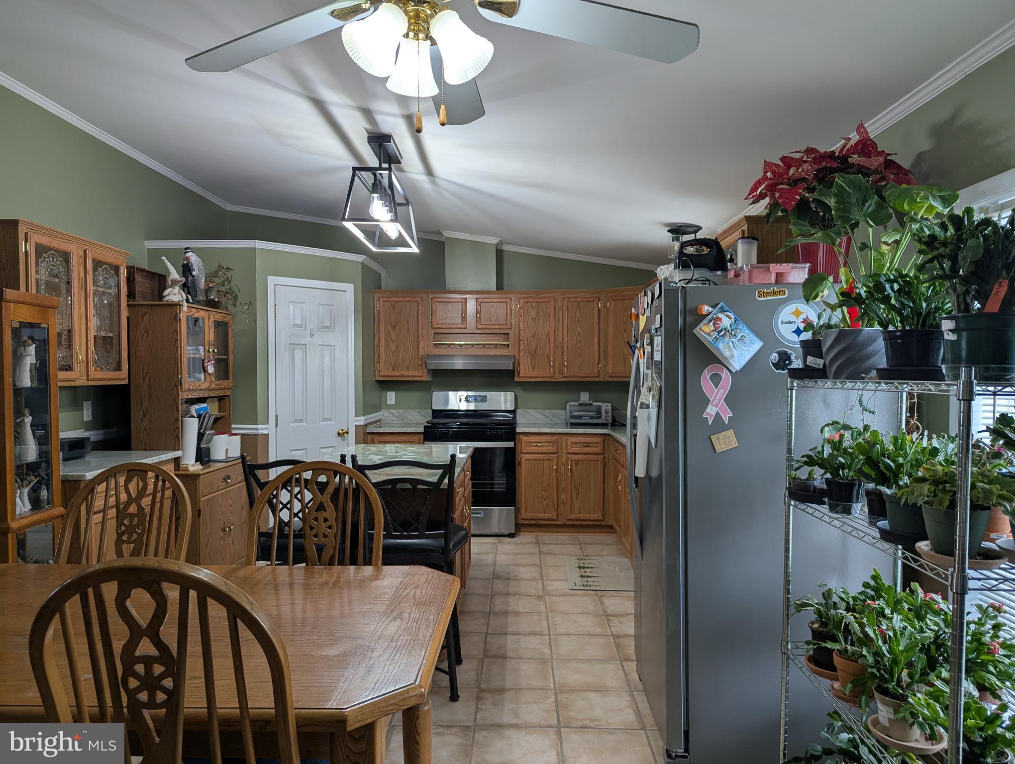 248 Williams Lane Red Hill, PA 18076 - Photo 25 of 37 a view of a dining room with furniture and chandelier