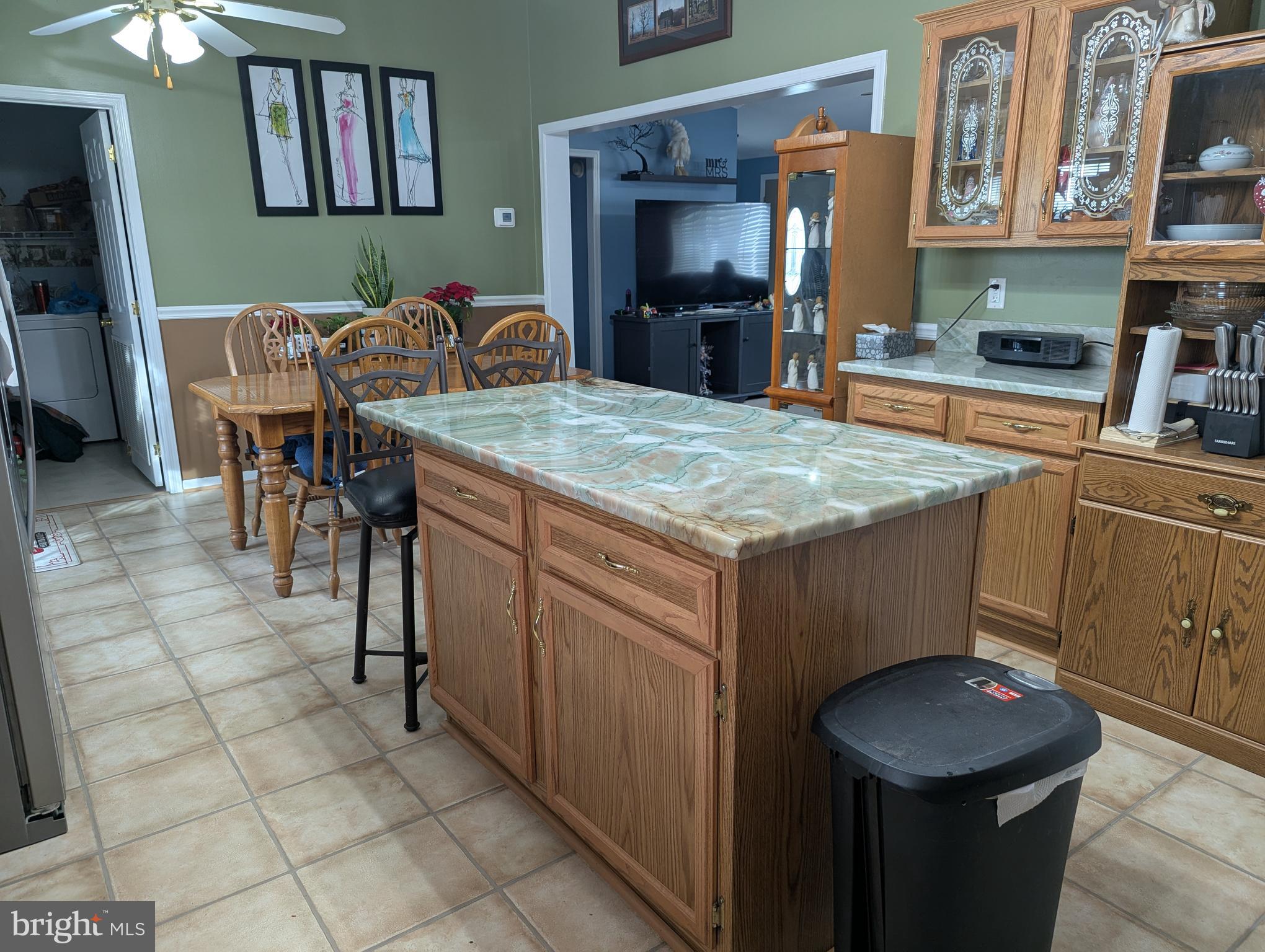 248 Williams Lane Red Hill, PA 18076 - Photo 26 of 37 a room with furniture a flat screen tv and kitchen view