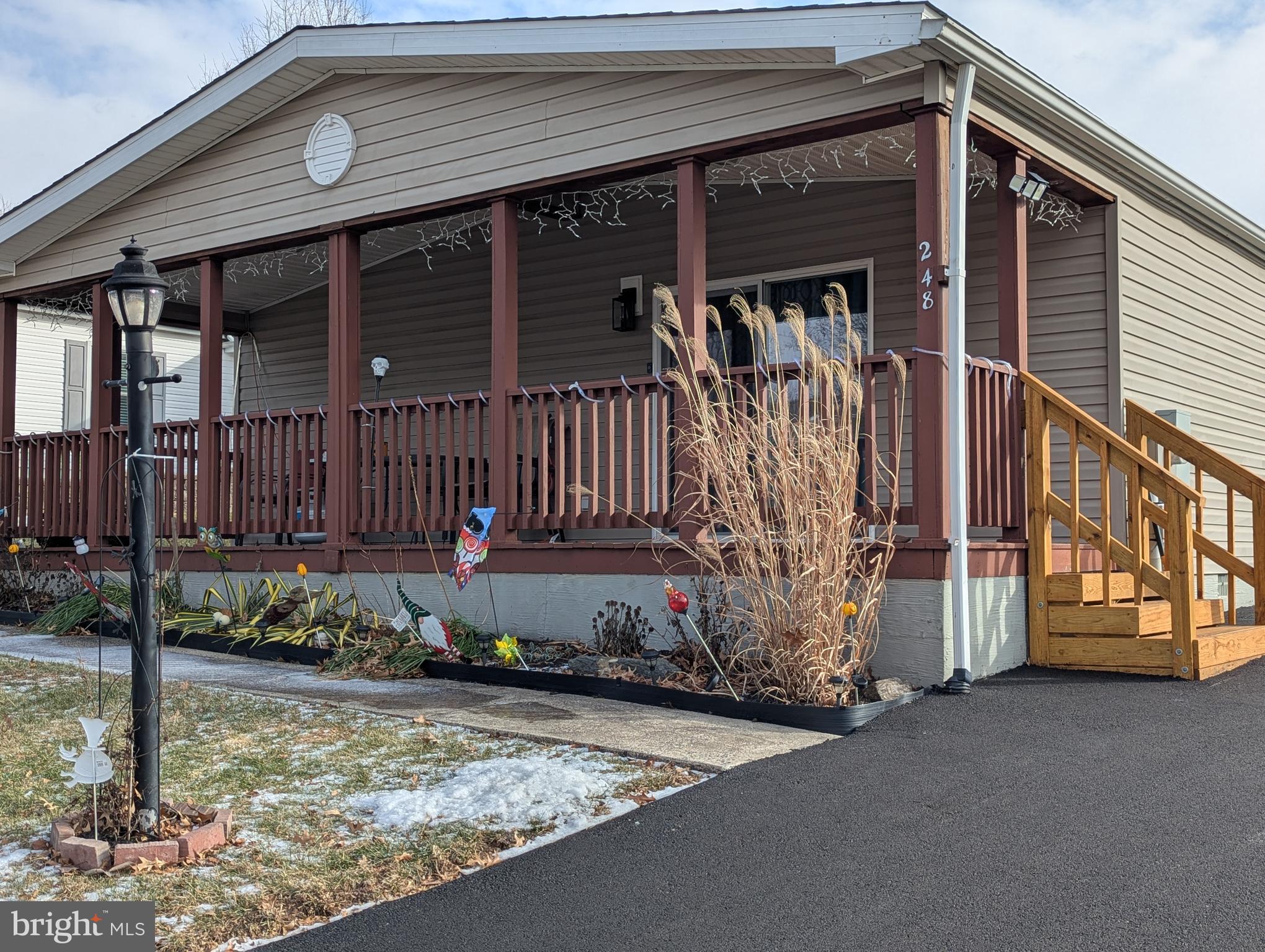 248 Williams Lane Red Hill, PA 18076 - Photo 30 of 37 a view of a house with a small yard and wooden fence