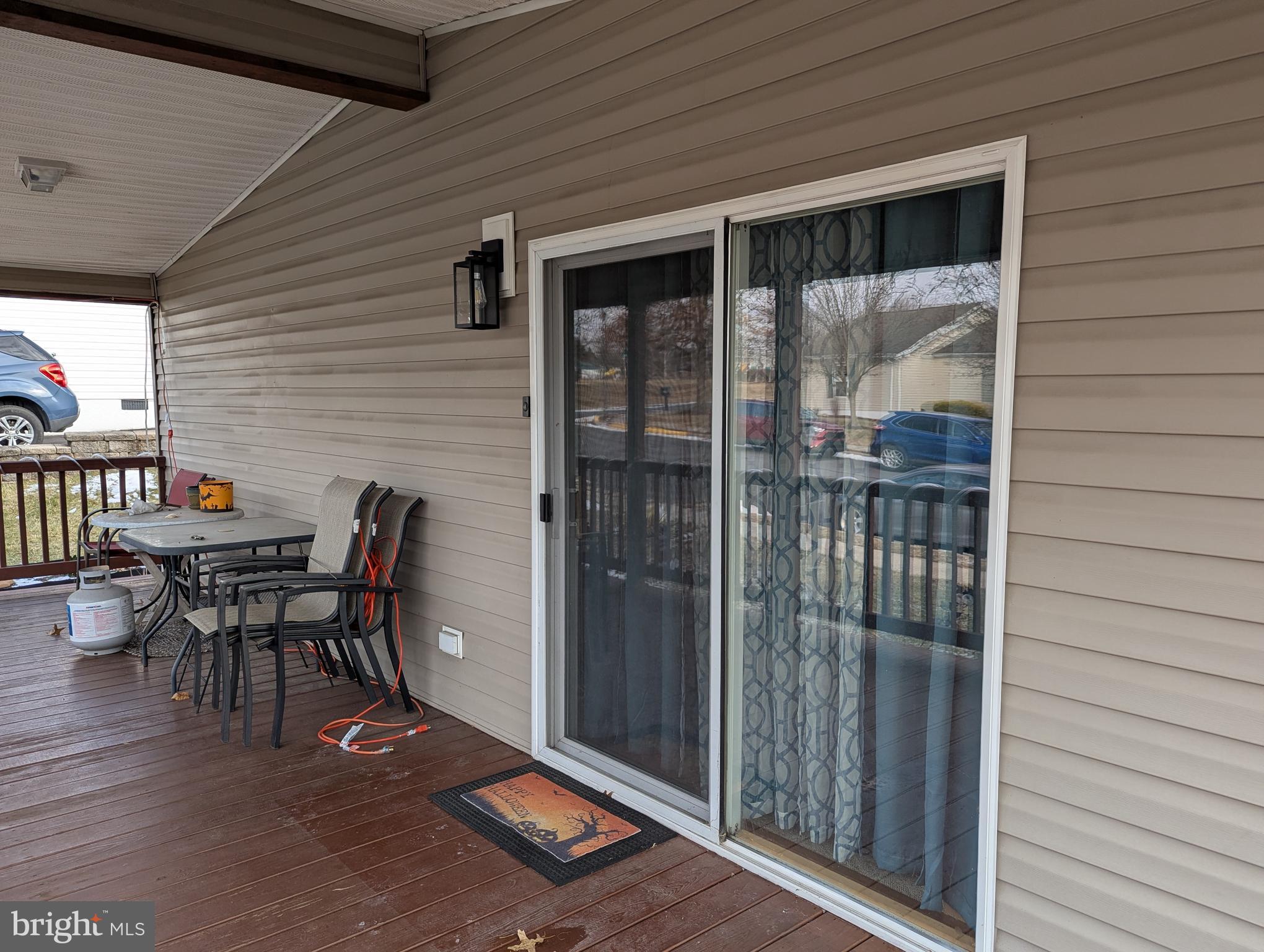 248 Williams Lane Red Hill, PA 18076 - Photo 33 of 37 a view of a porch with furniture and floor to ceiling window