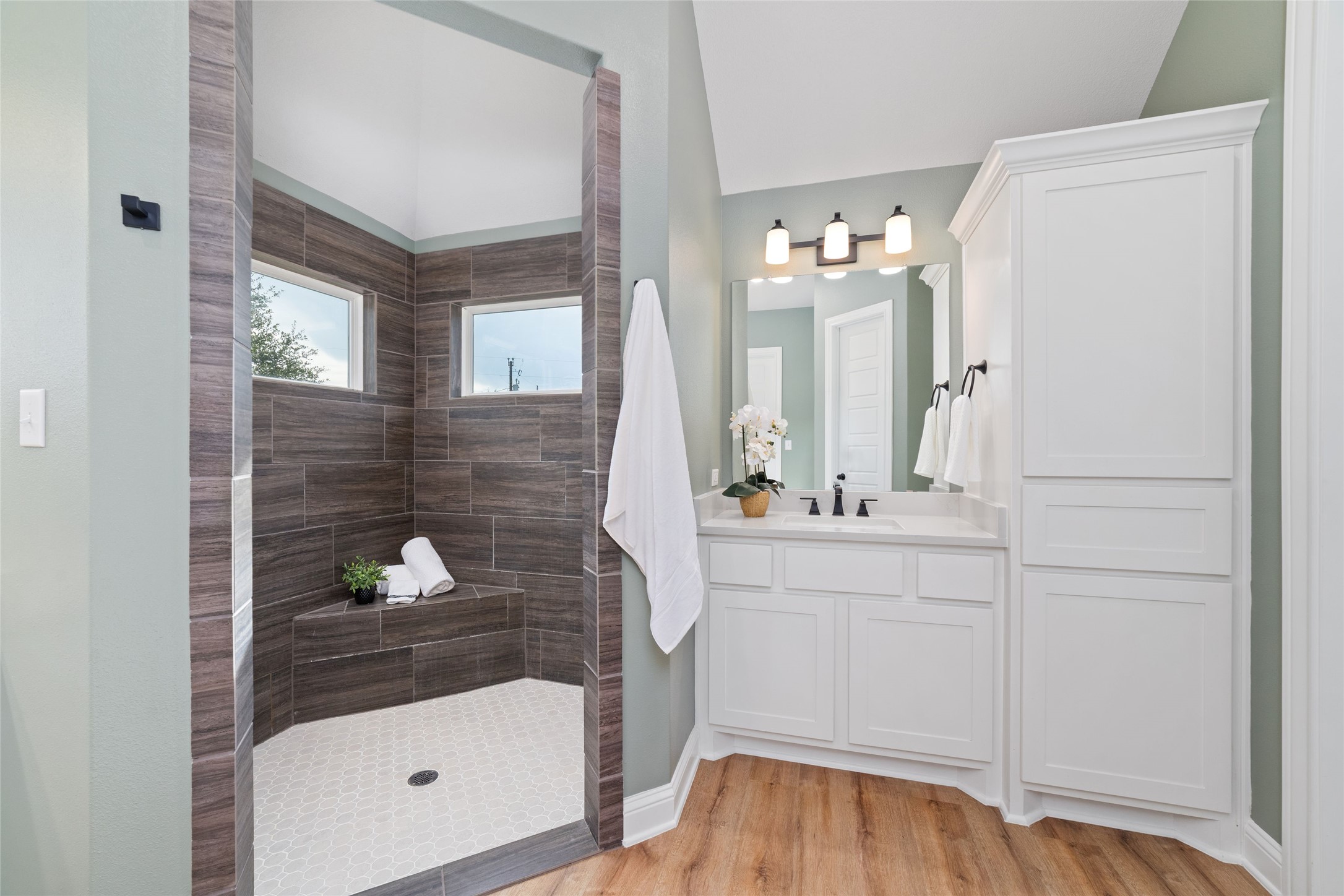 1011 Bonfire West Road Cat Spring, TX 78933 - Photo 24 of 48 Stunning shower! Who doesn't want to shower and star gaze at the same time! Second sink and plenty of storage with a built-in hamper.