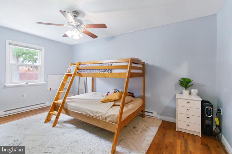 517 Golden Street Lititz, PA 17543 - Photo 8 of 14 a bedroom with a bed and a dresser