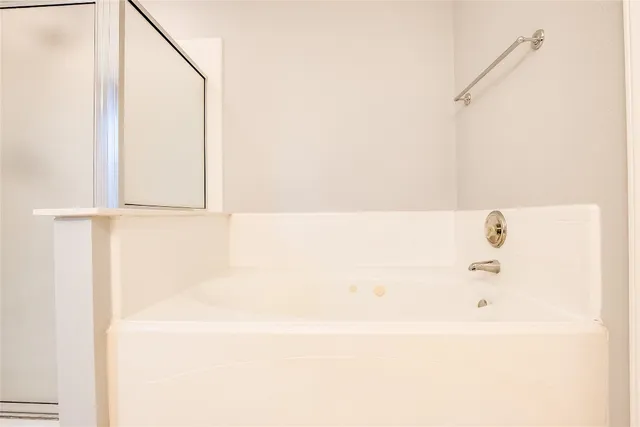 a bathroom with a bathtub