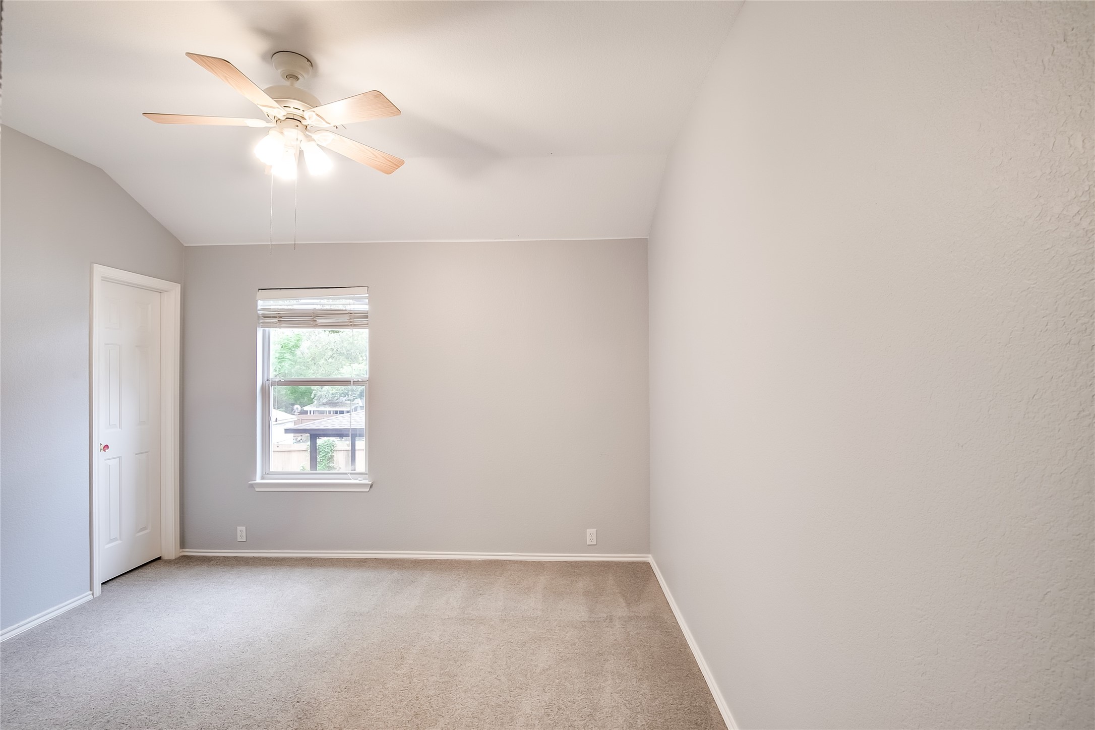 1204 Mathias Street Cedar Park, TX 78613 - Photo 26 of 32 an empty room with windows and fan