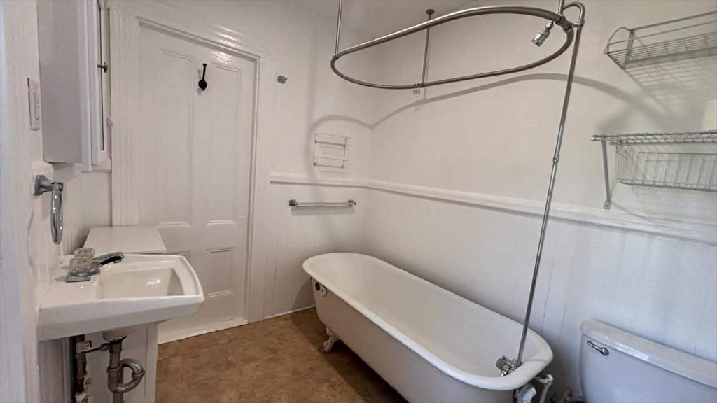 93 Peirce Street, Unit 2 Middleboro, MA 02346 - Photo 6 of 16 a bathroom with a sink a toilet and shower