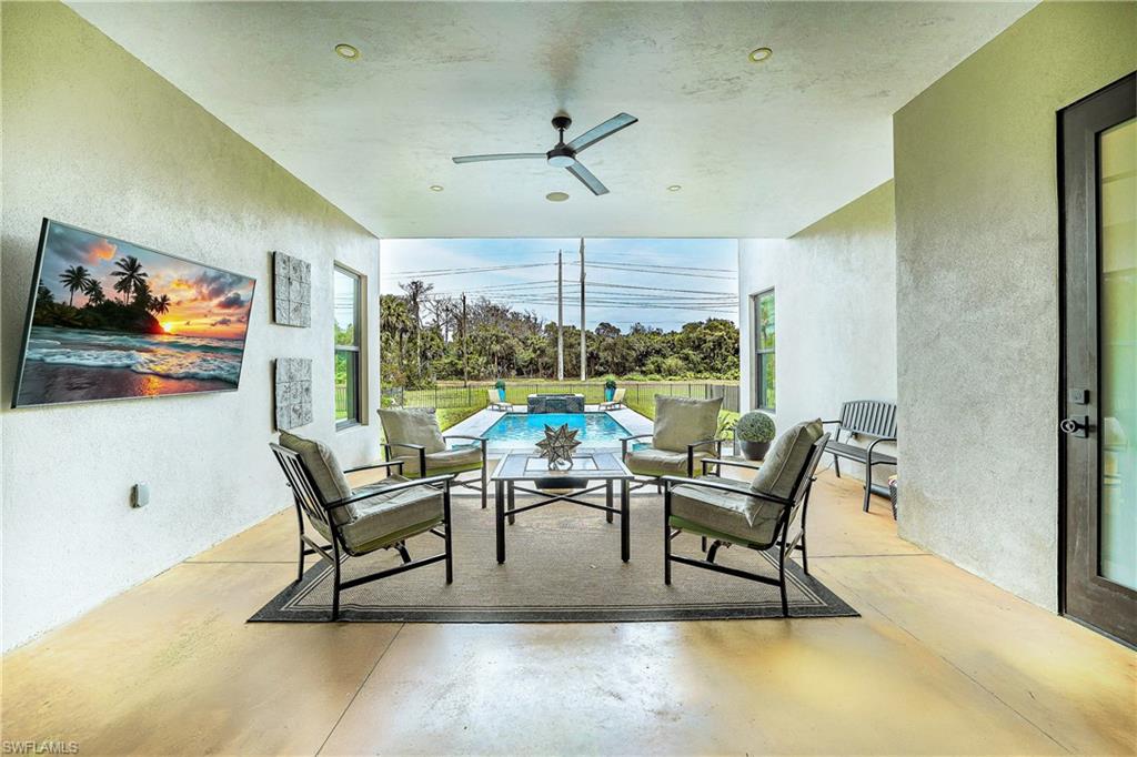4269 15th Avenue Southwest Naples, FL 34116 - Photo 6 of 30 a dining room with furniture and window
