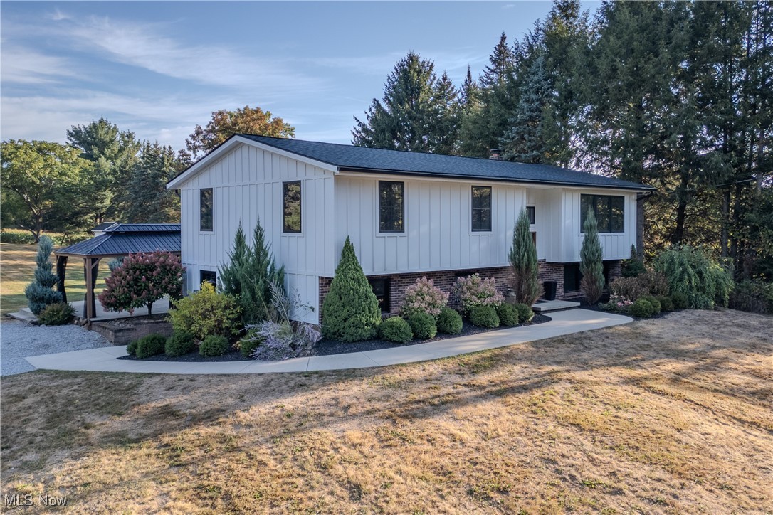 3459 Laubert Road Atwater, OH 44201 - Photo 1 of 39 View of front of house and board and batten siding