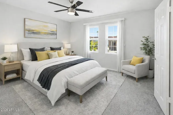 a bedroom with bed and window