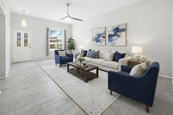 a living room with furniture and a window