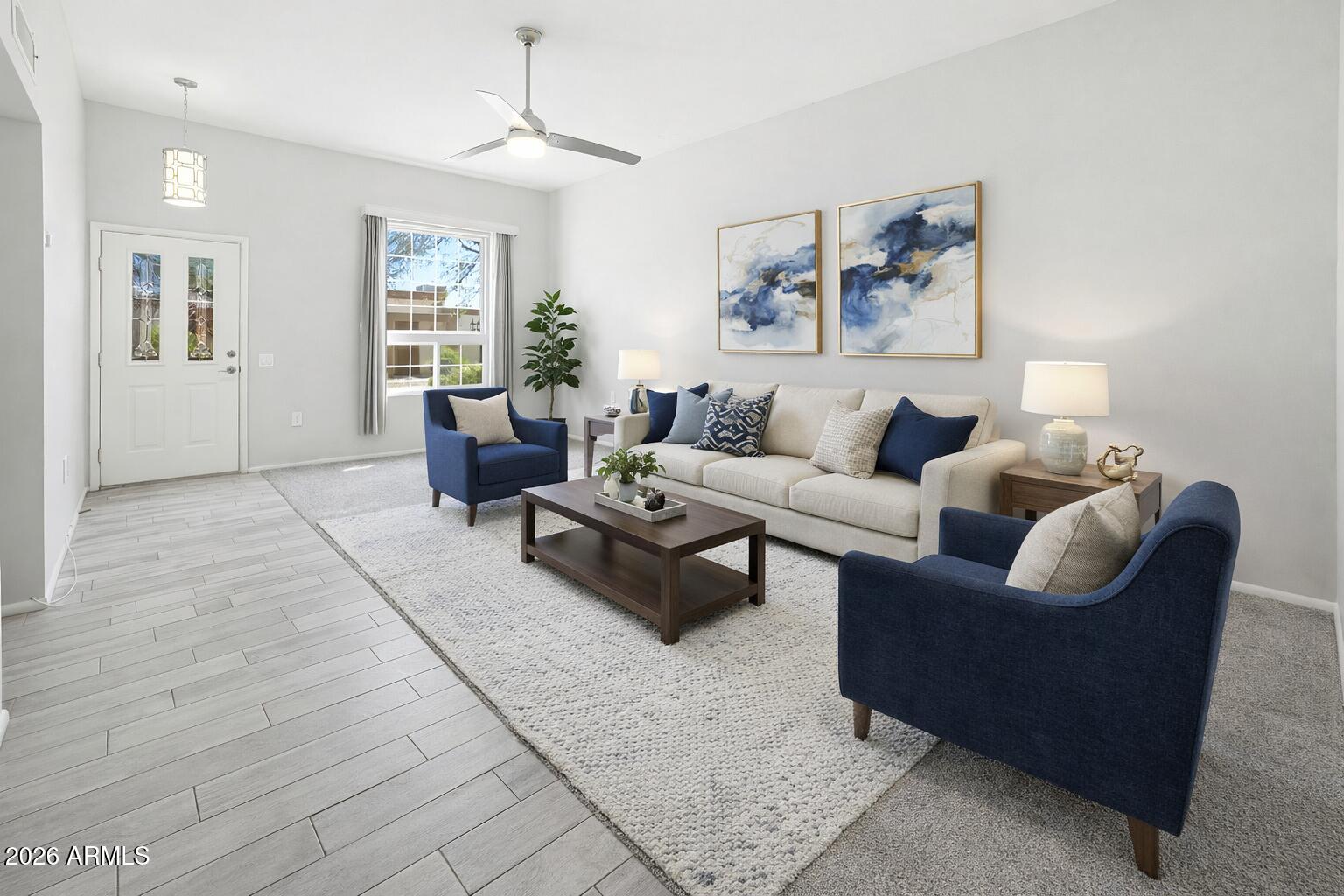 10030 West Royal Oak Road, Unit L Sun City, AZ 85351 - Photo 2 of 30 a living room with furniture and a window