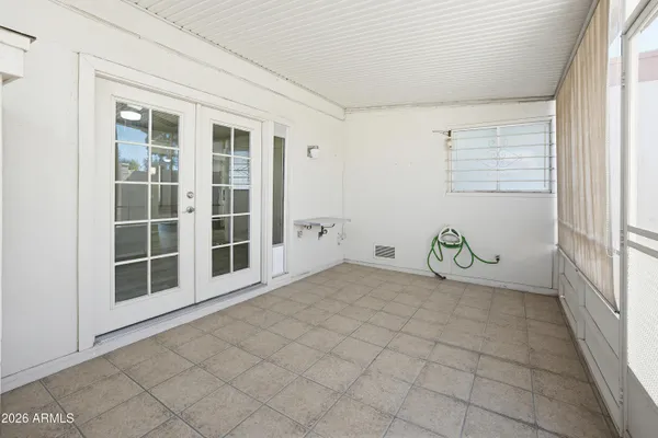 a view of a room with a window