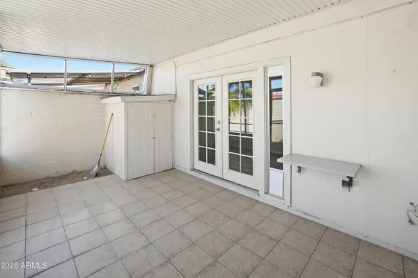 a view of a room with white walls