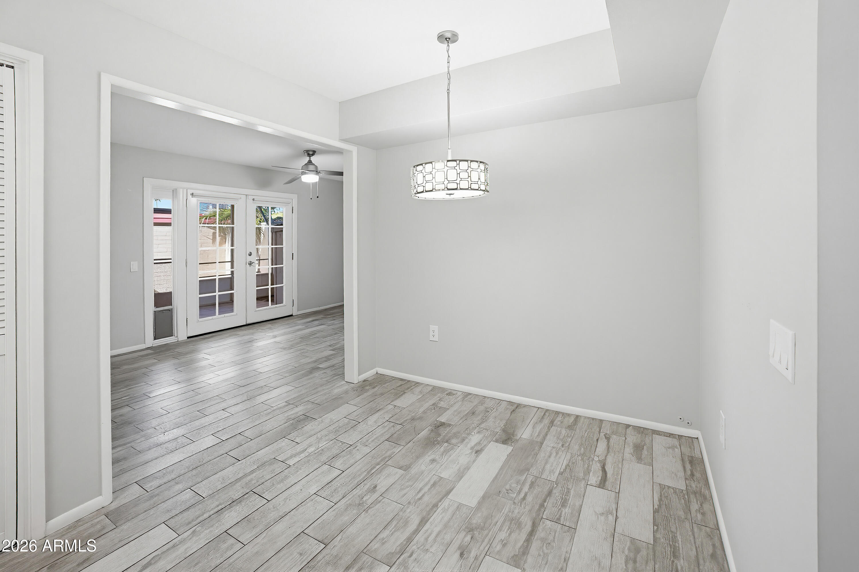10030 West Royal Oak Road, Unit L Sun City, AZ 85351 - Photo 9 of 30 a view of livingroom with hardwood