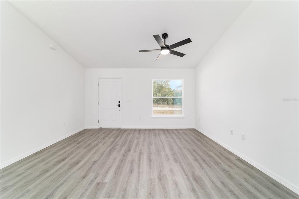 1922 Southwest Little Cliffs Drive Dunnellon, FL 34431 - Photo 16 of 37 an empty room that has a window