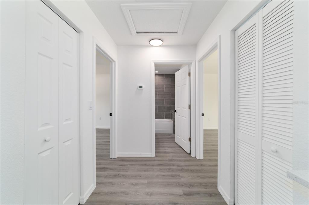 1922 Southwest Little Cliffs Drive Dunnellon, FL 34431 - Photo 22 of 37 a view of a hallway with wooden floor