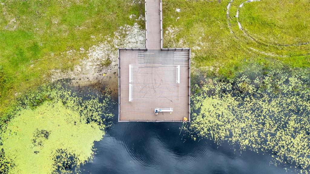 1922 Southwest Little Cliffs Drive Dunnellon, FL 34431 - Photo 29 of 37 a building view with a garden