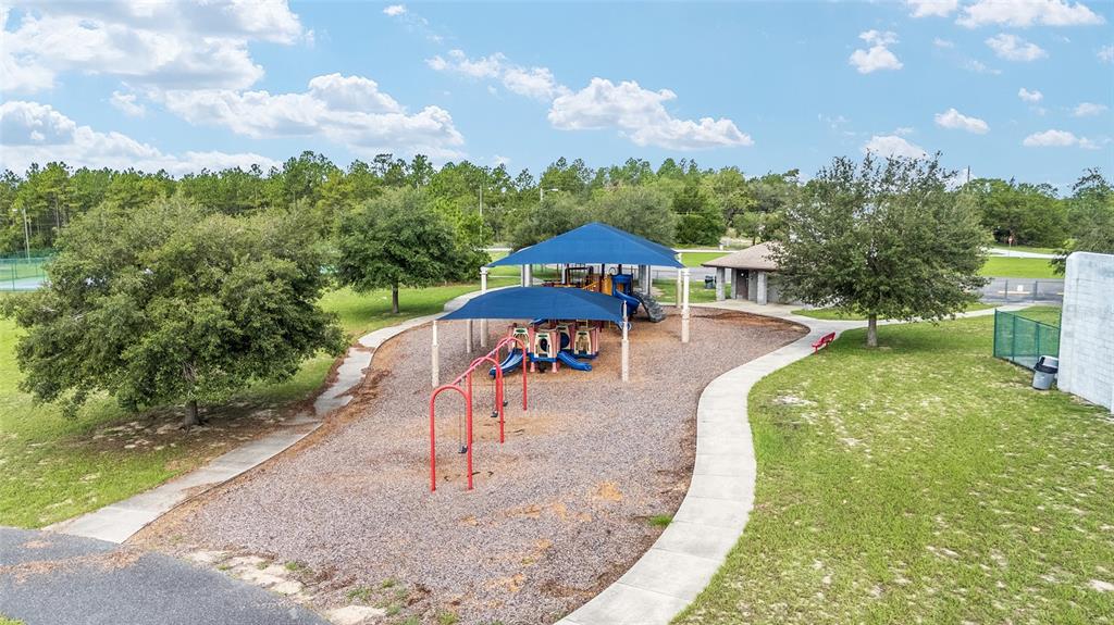1922 Southwest Little Cliffs Drive Dunnellon, FL 34431 - Photo 32 of 37 an outdoor space with seating