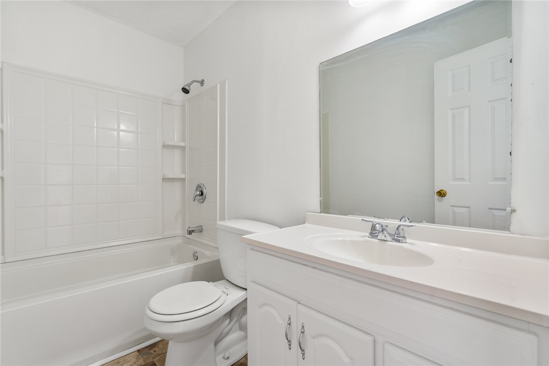 2305 Millgate Road Anderson, SC 29621 - Photo 14 of 18 A well-appointed bath features a tub and shower combo alongside a pristine vanity.