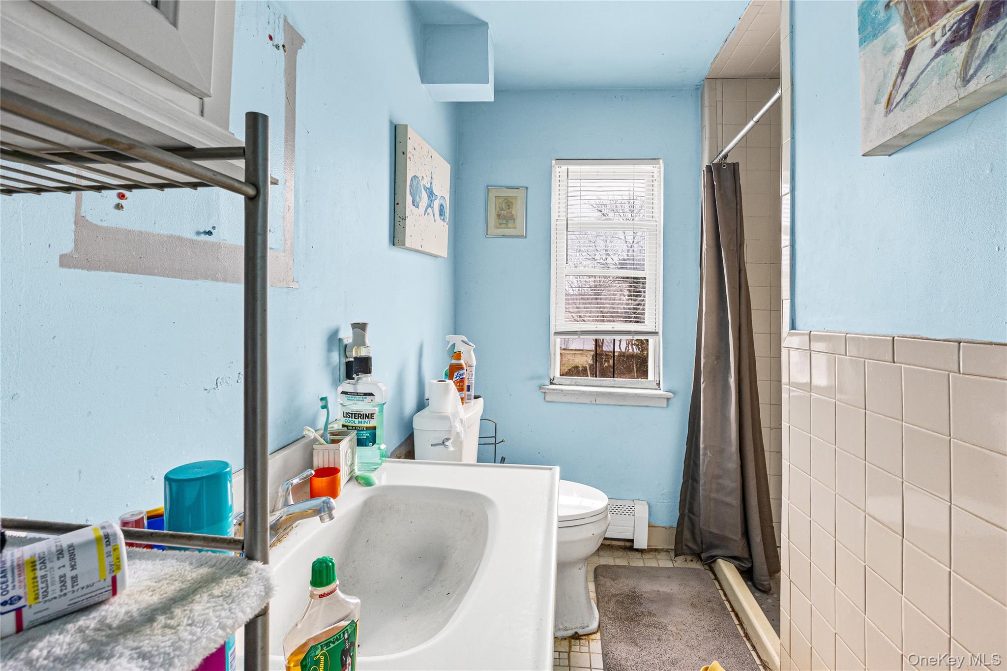34 Mervin Street Inwood, NY 11096 - Photo 15 of 26 a dining room with a window