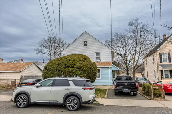 a car parked in front of a house
