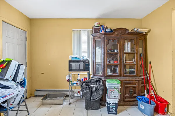 a living room with lots of furniture and a flat screen tv