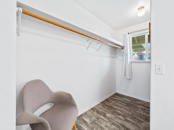 a view of small space with wooden floor