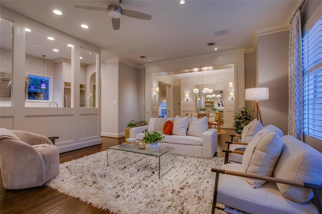 3810 Hawthorne Avenue Dallas, TX 75219 - Photo 17 of 40 a living room with furniture and a large window