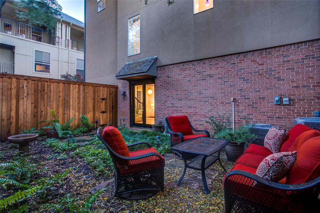 3810 Hawthorne Avenue Dallas, TX 75219 - Photo 35 of 40 a backyard of a house with outdoor seating