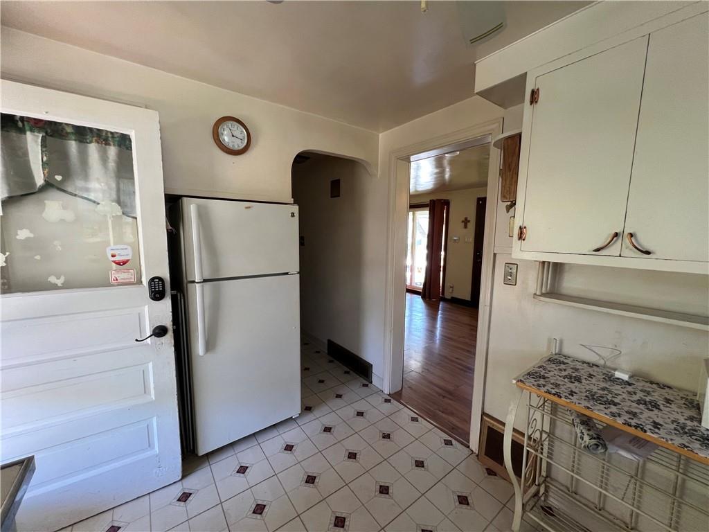 413 Rustic Road North Versailles, PA 15137 - Photo 11 of 20 a kitchen with stainless steel appliances granite countertop a refrigerator and a stove