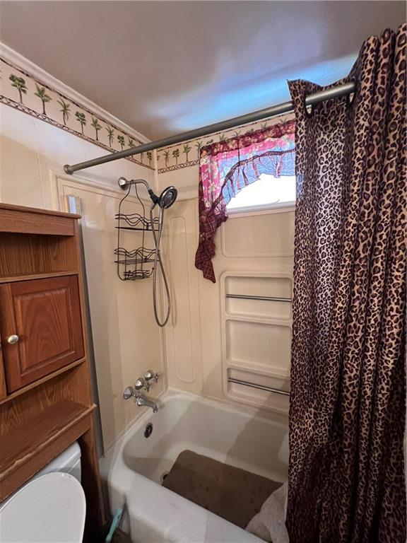 413 Rustic Road North Versailles, PA 15137 - Photo 13 of 20 a bathroom with a bathtub and a shower