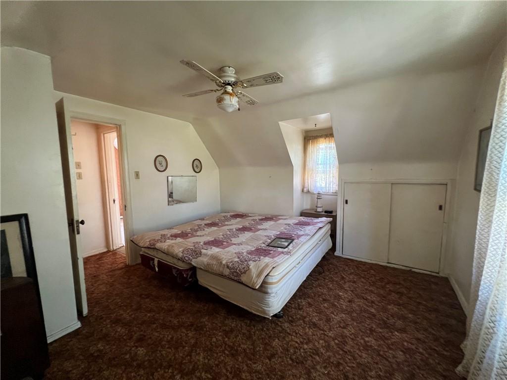 413 Rustic Road North Versailles, PA 15137 - Photo 15 of 20 a bedroom with a bed and a mirror