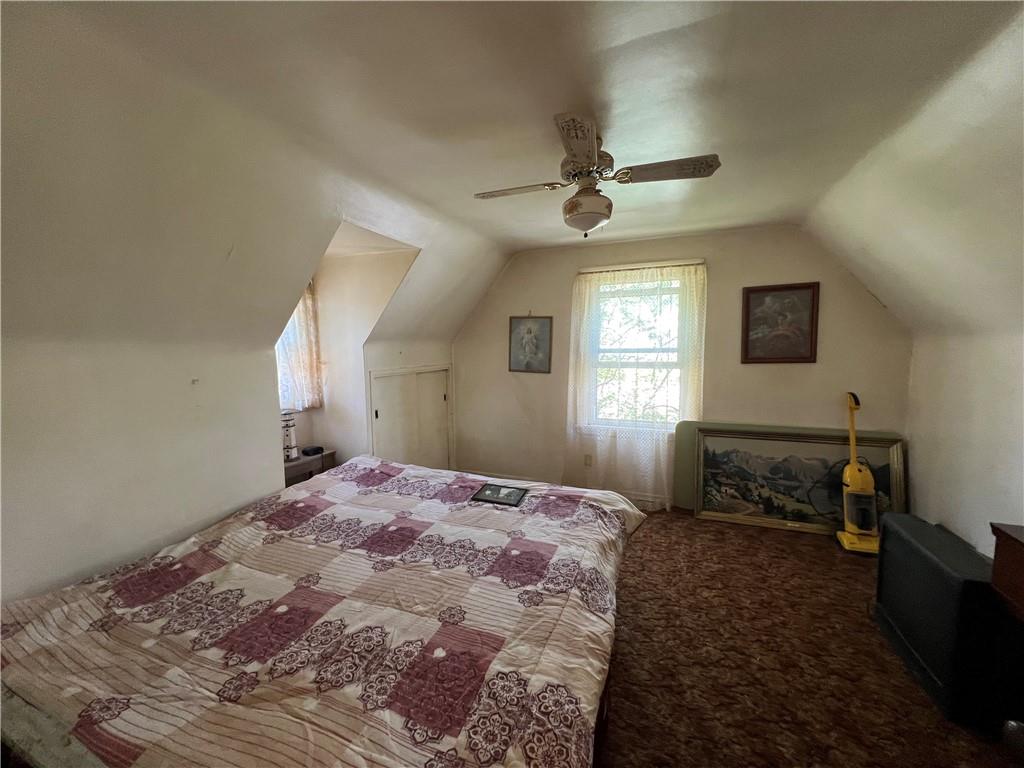 413 Rustic Road North Versailles, PA 15137 - Photo 16 of 20 a bedroom with a bed and a window