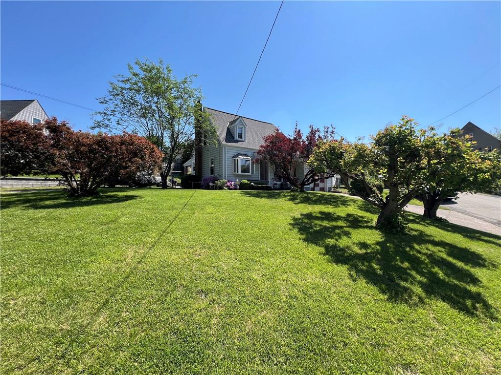 413 Rustic Road North Versailles, PA 15137 - Photo 3 of 20 a view of a house with a yard