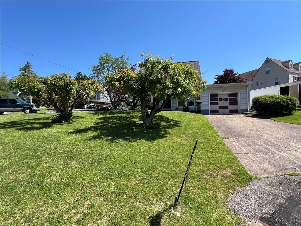 413 Rustic Road North Versailles, PA 15137 - Photo 4 of 20 a view of a house with a yard