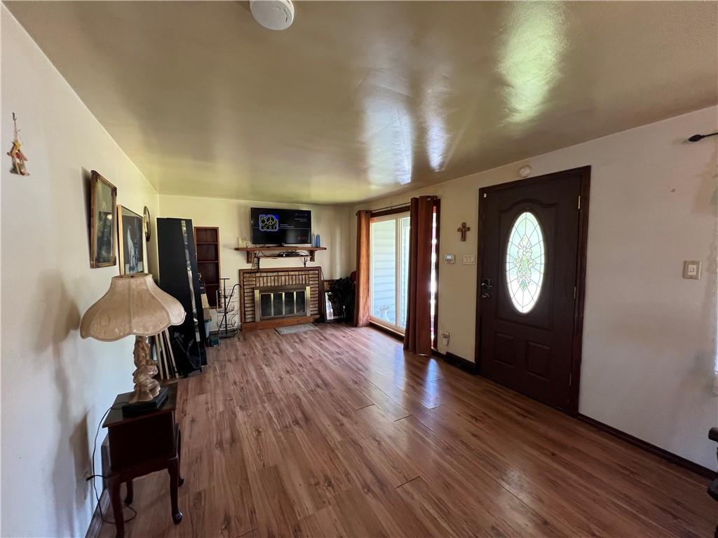 413 Rustic Road North Versailles, PA 15137 - Photo 8 of 20 a view of livingroom with furniture wooden floor and window
