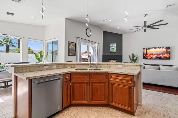 a kitchen with a sink and cabinets