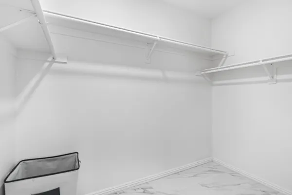 a view of an empty walk in closet