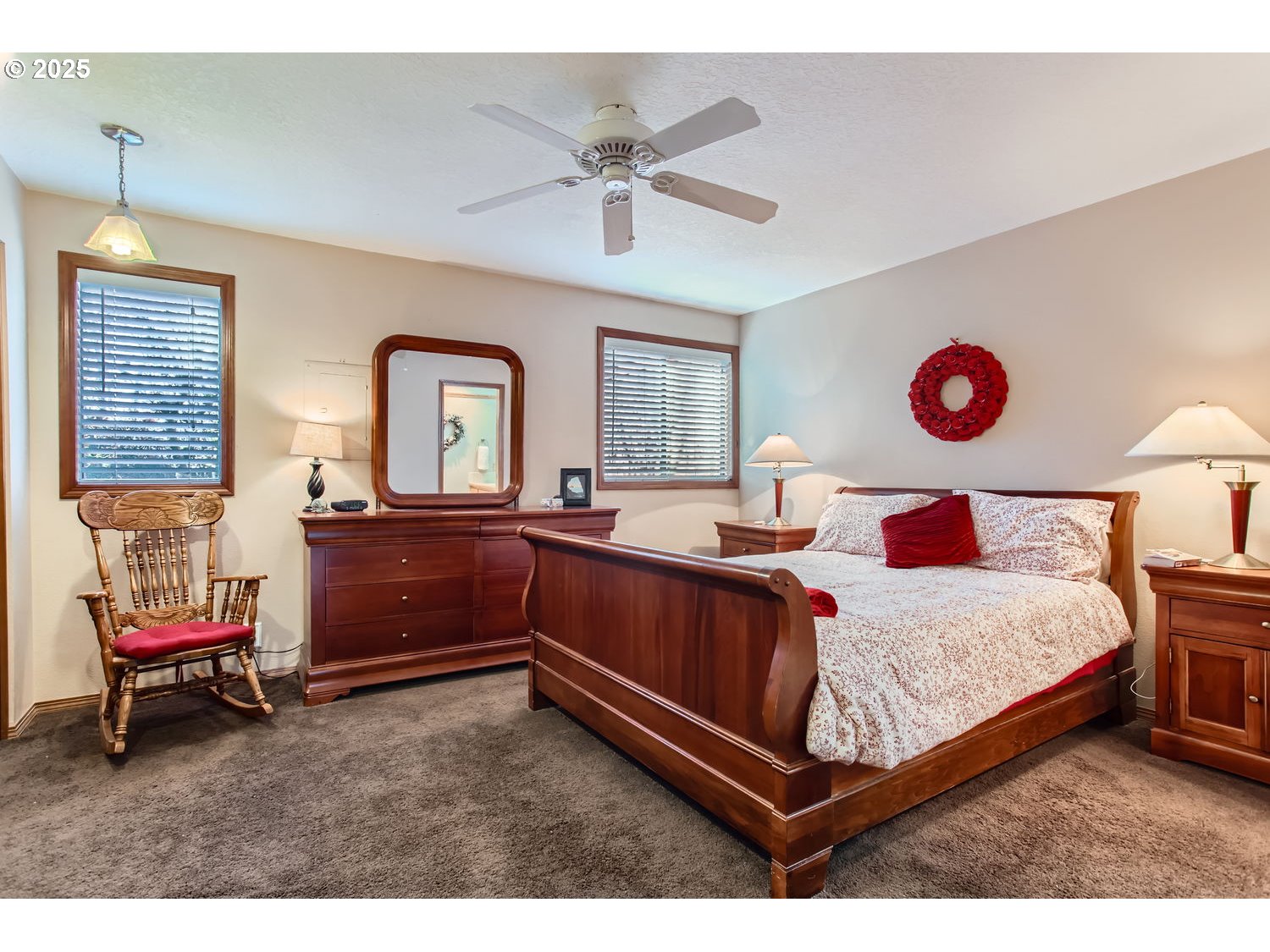 15655 Southwest 114th Court, Unit 10 Portland, OR 97224 - Photo 19 of 27 a bedroom with a bed and window